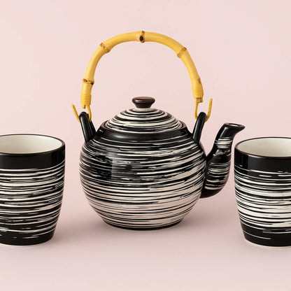 Teapot and cups - artisanal elegance and precious gluttony